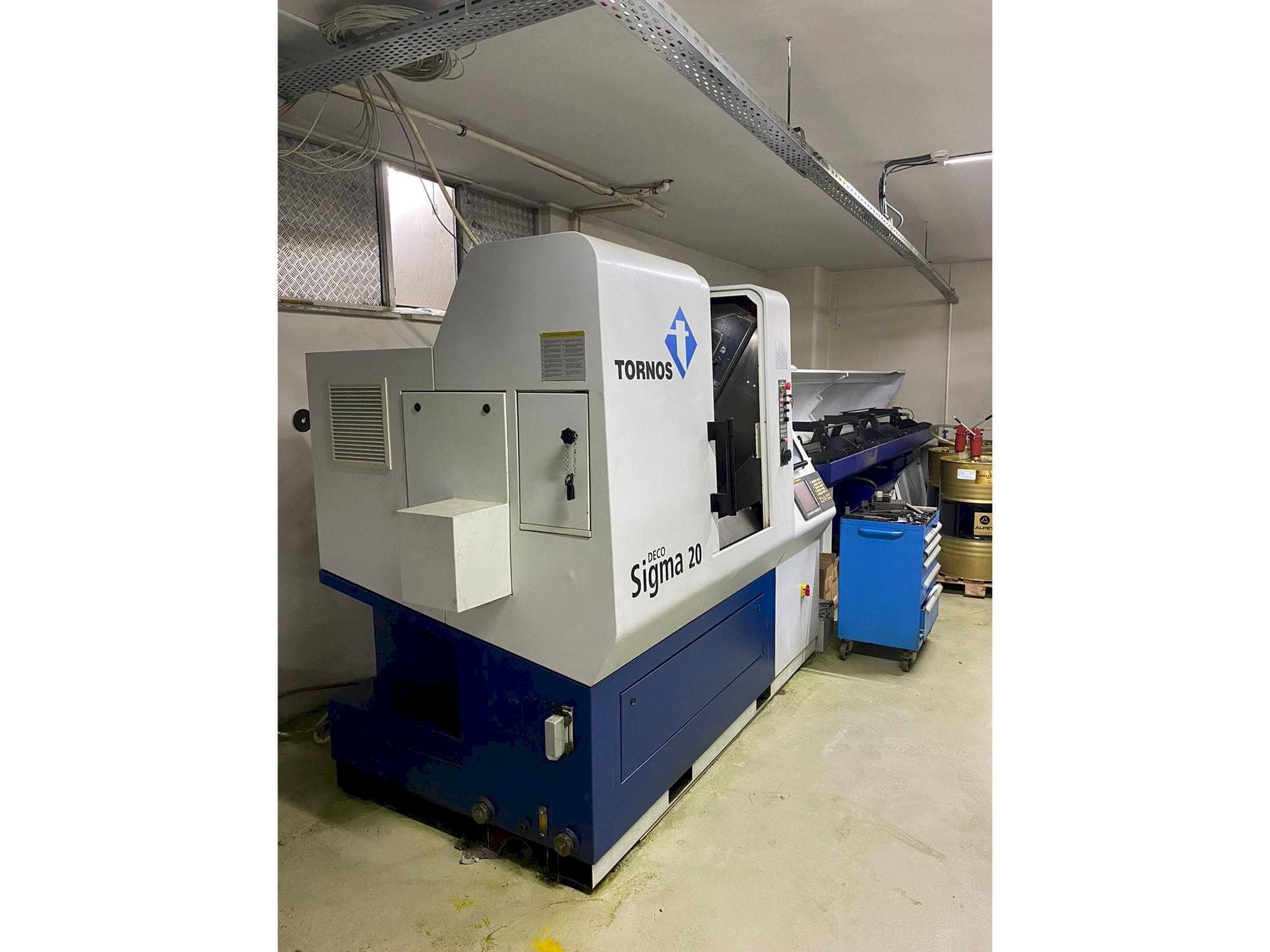 A Tornos Delta Sigma 20 gép oldalnézete