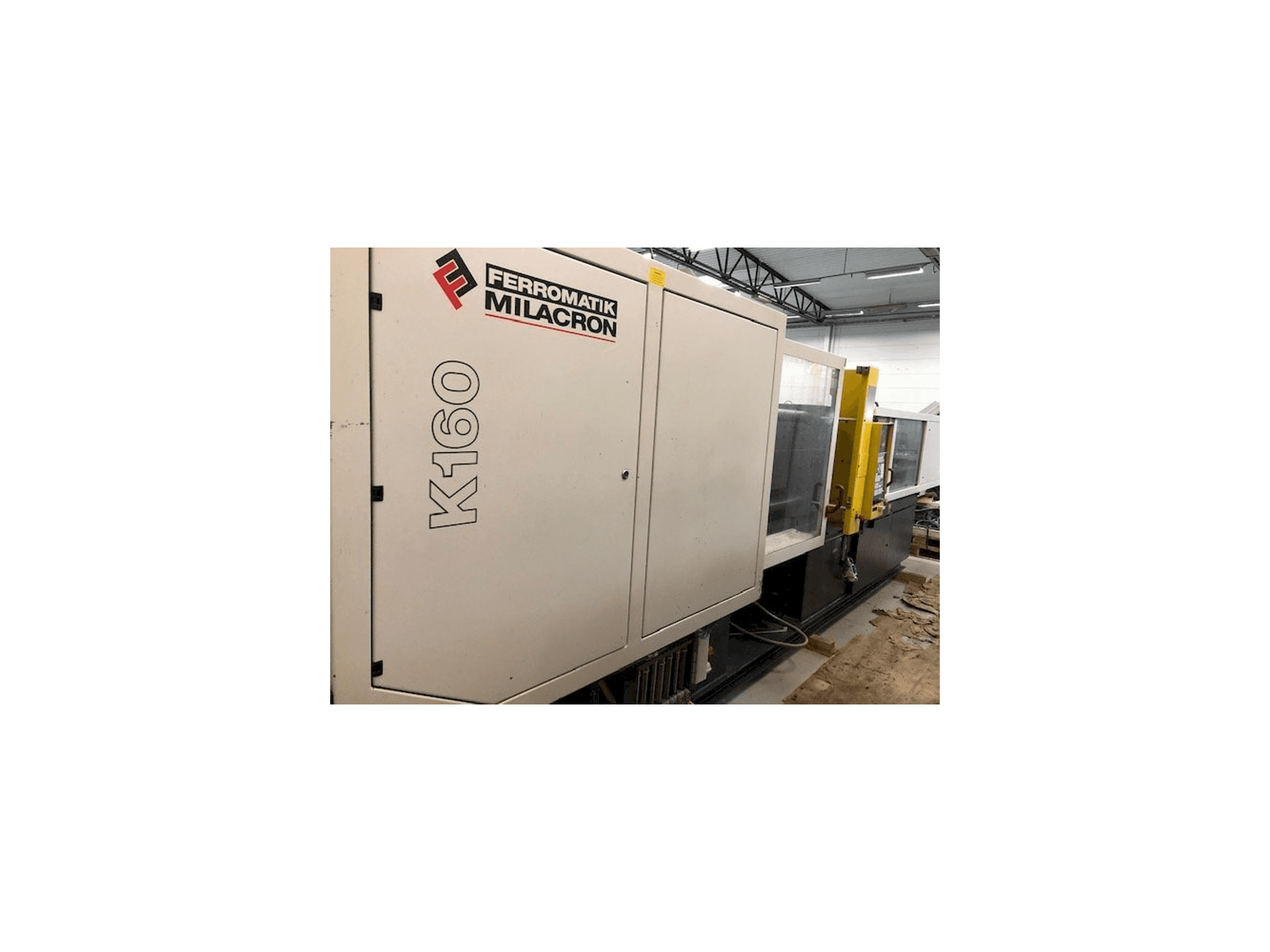 A Ferromatik MILACRON K160 gép elölnézete