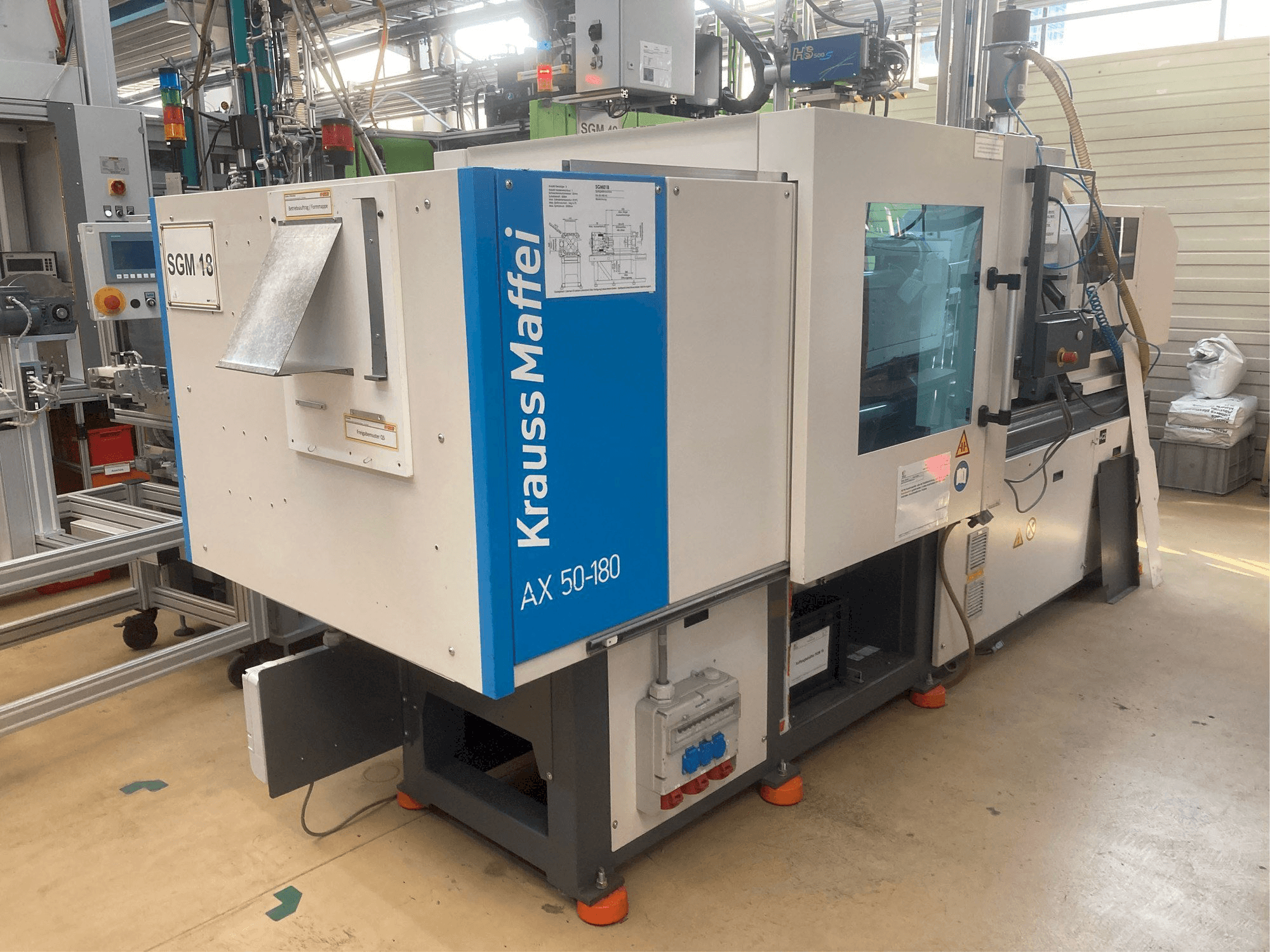 A Krauss Maffei AX 50-180 gép oldalnézete