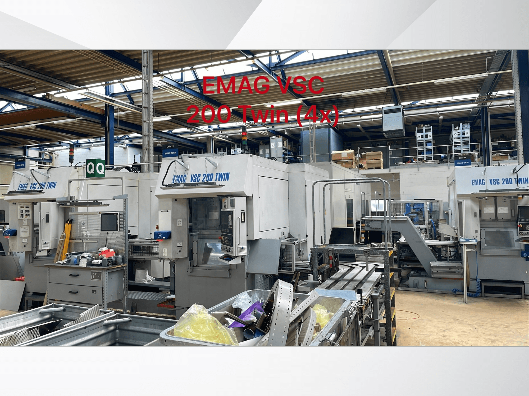 EMAG VSC 200 TWIN OP 40 függőleges esztergagépek gyári környezetben, elölnézetben több egység és berendezés látható.