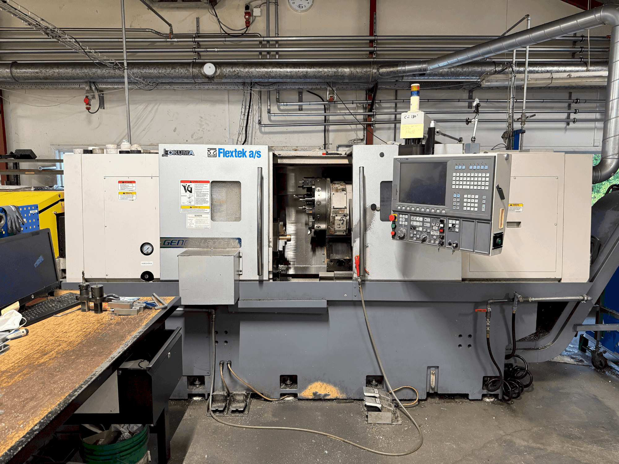 A Okuma Genos L300E-M with FMB Turbo 8-80 gép elölnézete